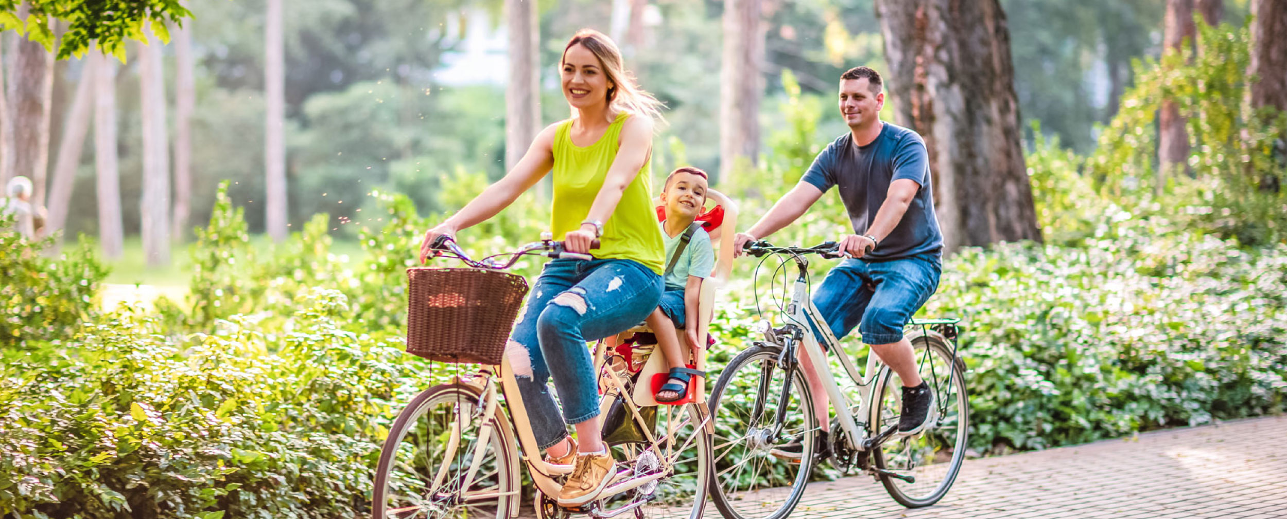 Family Riding Bikes Outdoors